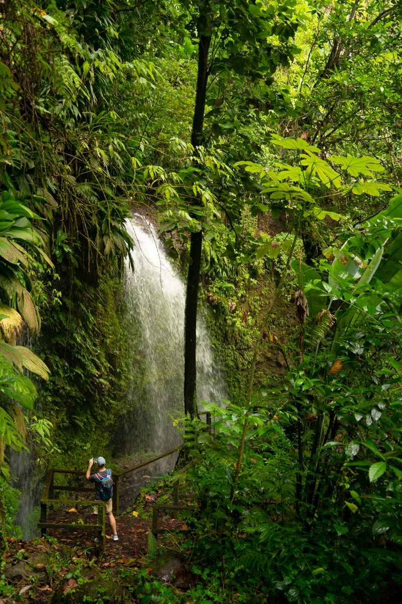man taking photos of Salton Waterfall while on the viewing platform
