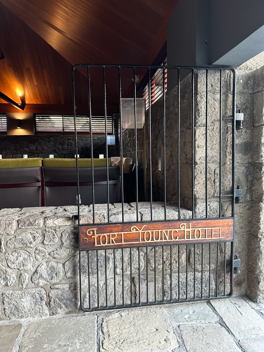 gate into the Fort Young Hotel with sign