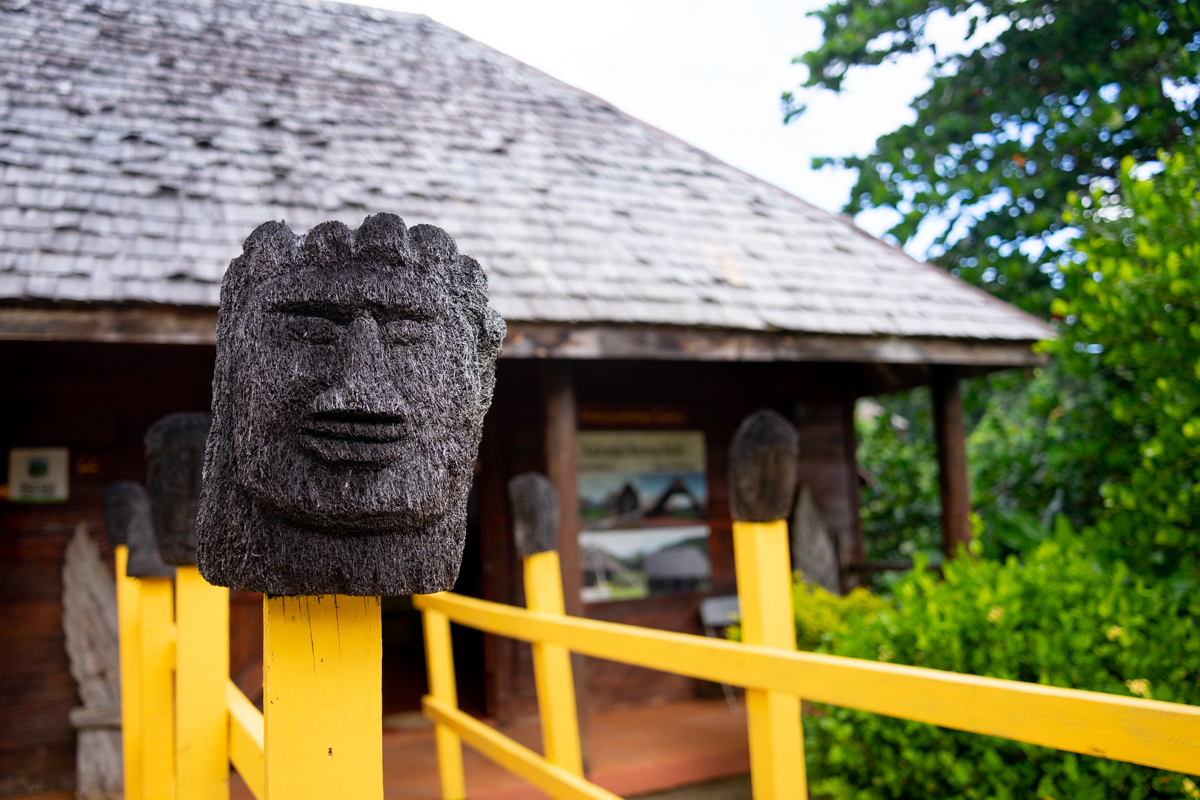 Carved statue head on top of a post entering the Kalinago territory 