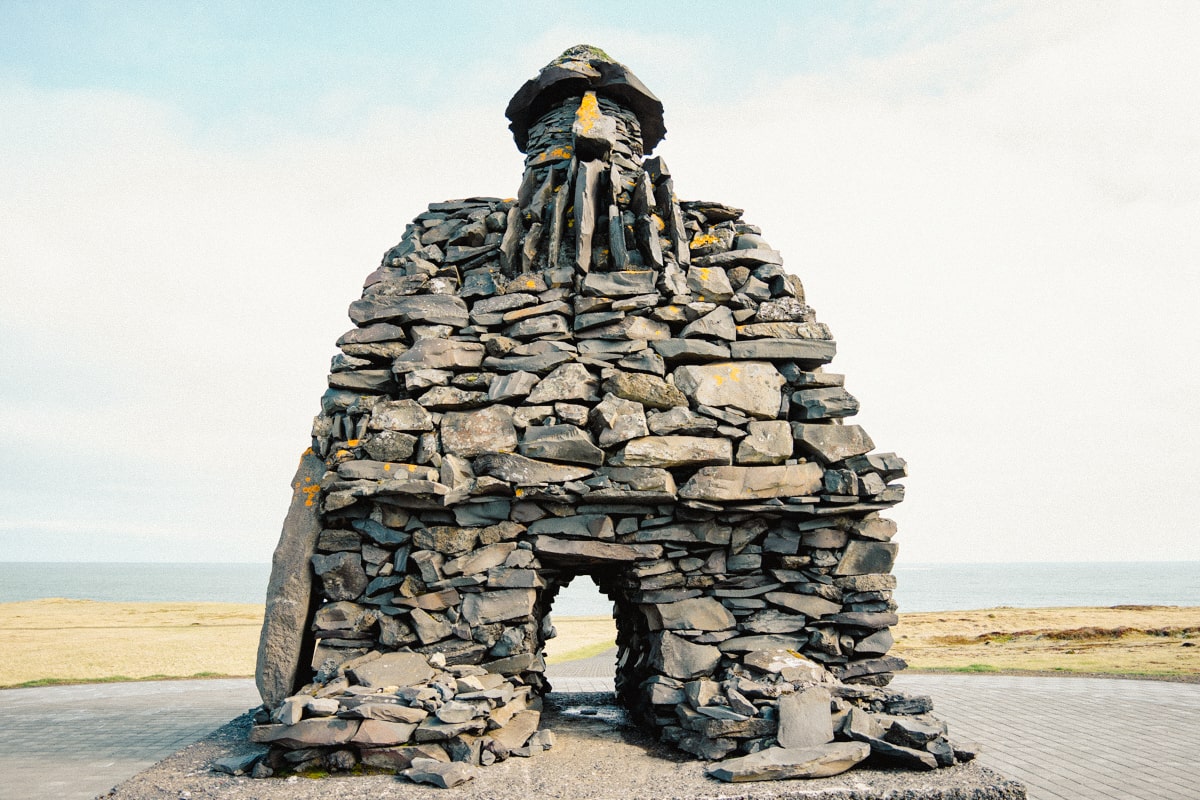 A rock mounment in the shape of man called Bard of Snaefellsnes in Iceland
