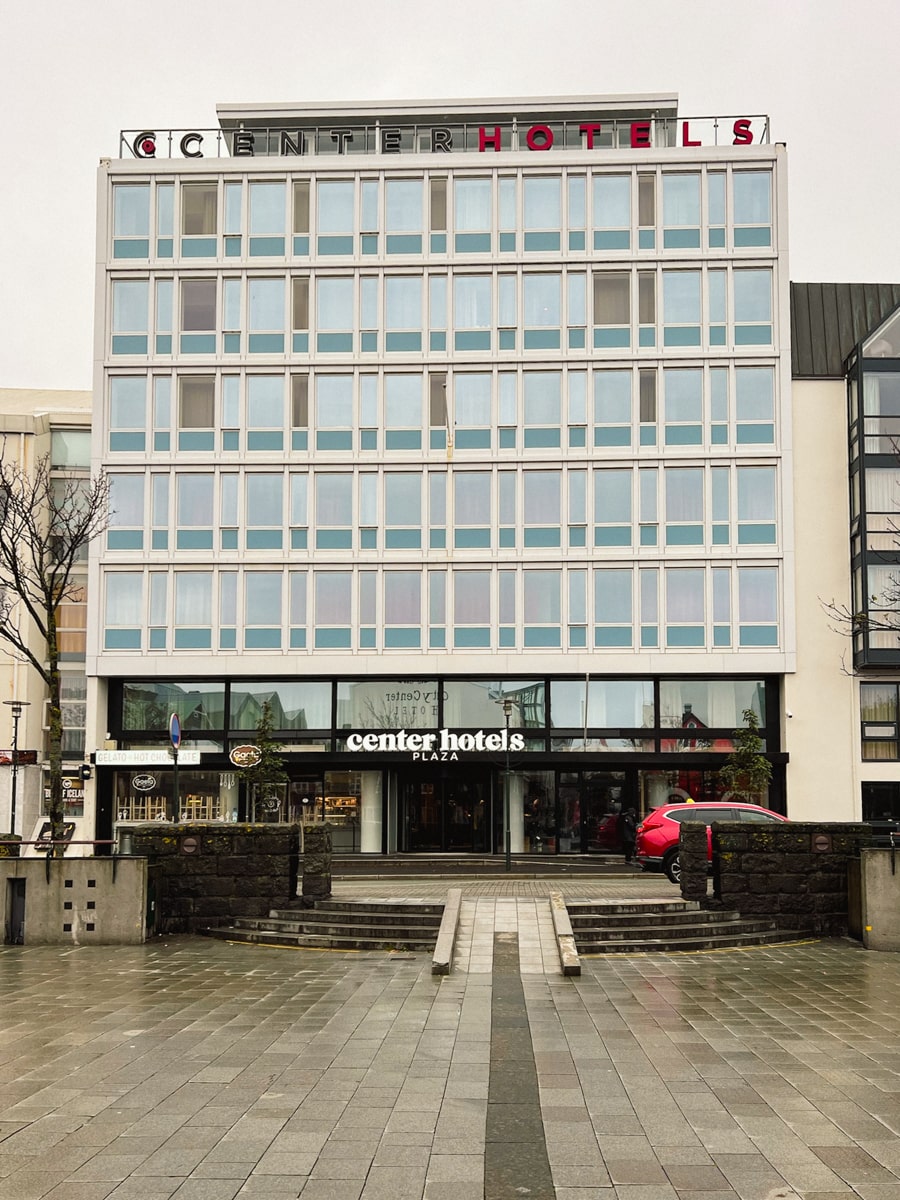 picture of the Center Hotels Plaza from the square center during a gray rainy day in Reykjavik 