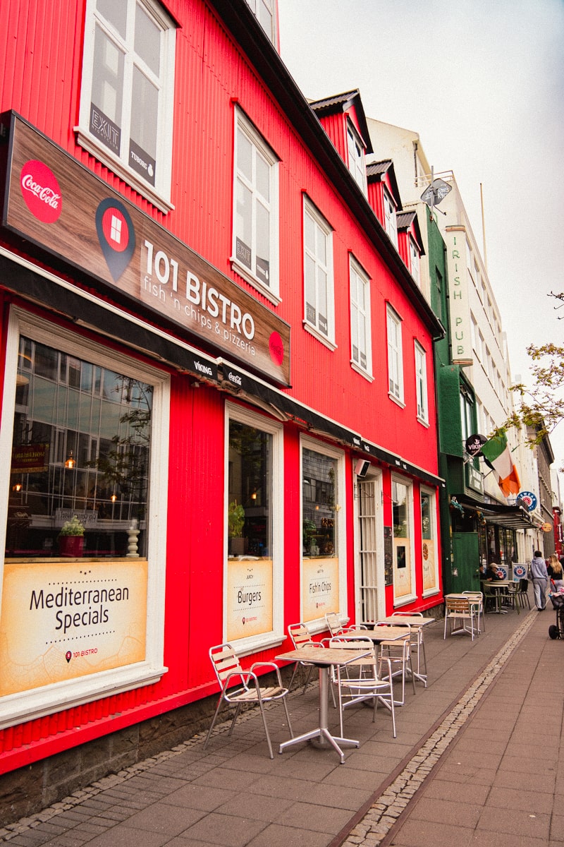 a red building that is a fish & chip and pizza shop in Reykjavik Iceland