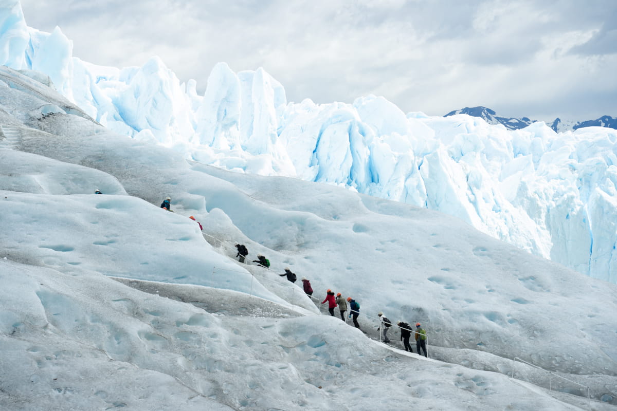 people trekking on Perito Moreno glacier in El Calafate Argentina