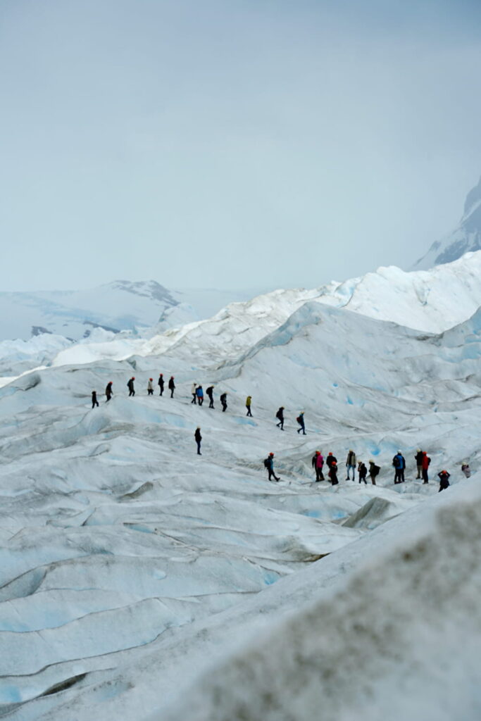 People walking along the Perito Moreno glacier